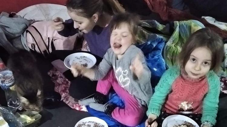 Yuliia and her three daughters hid in underground bunkers for several weeks - BBC - BBC