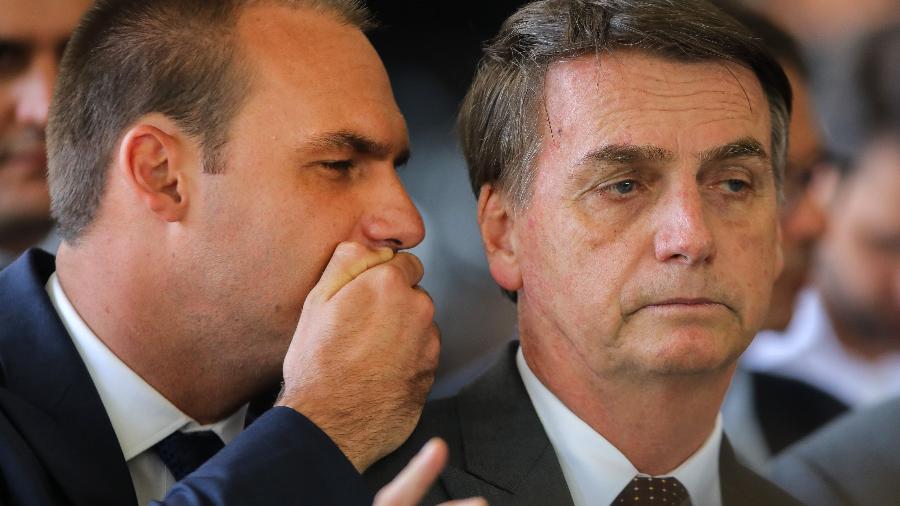 Eduardo Bolsonaro e Jair Bolsonaro - 14.nov.2018 - Sergio Lima/AFP