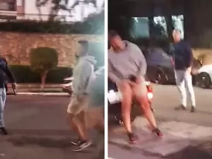 Policial baleado após urinar na rua foi desarmado por lojista antes; vídeo