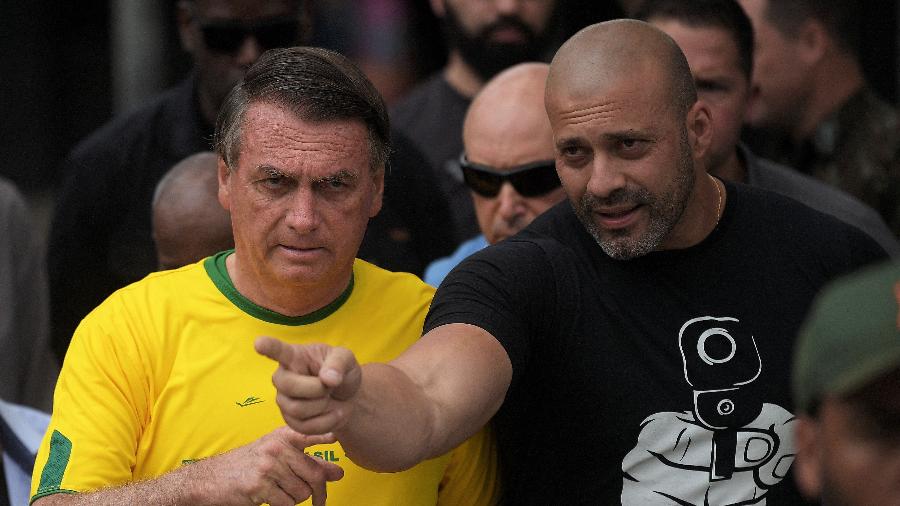 O presidente Jair Bolsonaro (PL) e Daniel Silveira (PTB) - Carl de Souza/AFP
