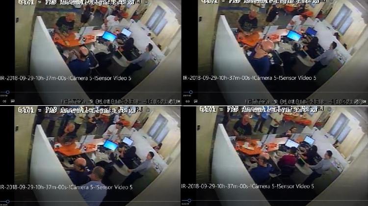 1º.out.2018 - Câmeras do circuito interno de agência bancária da Alerj mostram quando Fabrício Queiroz, então assessor do deputado Flávio Bolsonaro, pagou dois boletos escolares das filhas do político. Para o MP-RJ, o pagamento foi feito com dinheiro obtido na prática da rachadinha - Reprodução - 1º.out.2018 - Reprodução - 1º.out.2018