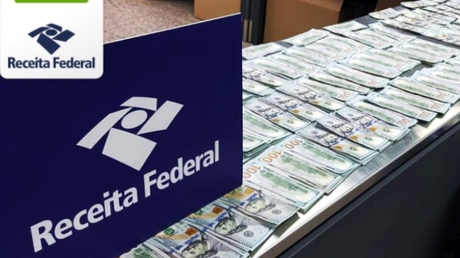 Os US$ 500 mil em notas foram achados em pacotes de café - Divulgação/Receita Federal