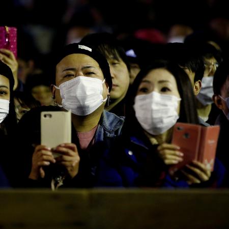 Plateia assiste a festival usando máscaras de proteção em prevenção contra a transmissão do coronavírus - Kim Kyung-Hoon/Reuters