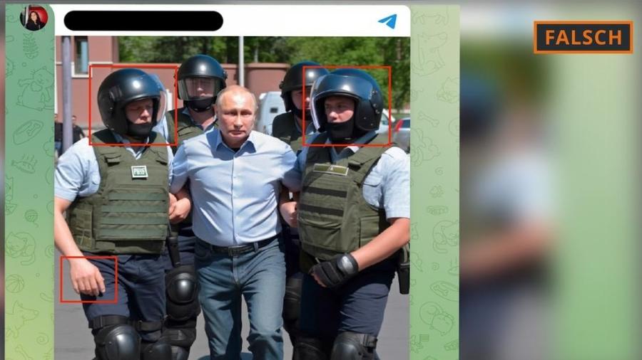 Esta foto da prisão de Putin é falsa, o que pode ser reconhecido, por exemplo, por um sexto dedo e as viseiras "escorrendo" dos capacetes  - Reprodução/DW