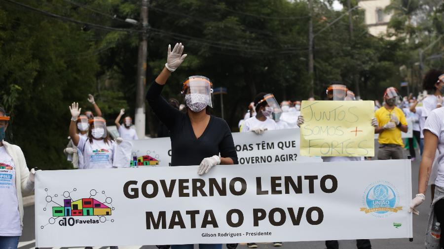 18.mai.2020 - Moradores da favela de Paraisópolis, em São Paulo, realizam uma manifestação pedindo apoio do governo estadual às comunidades em um possível  lockdown - ALICE VERGUEIRO/ESTADÃO CONTEÚDO