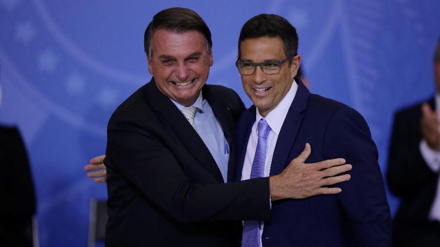 24.fev.2021 - O então presidente Jair Bolsonaro e o presidente do Banco Central, Roberto Campos Neto