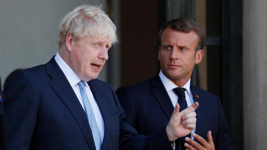 O presidente da França, Emmanuel Macron, e o primeiro-ministro do Reino Unido, Boris Johnson, após encontro para discutir o Brexit - Gonzalo Fuentes/Reuters