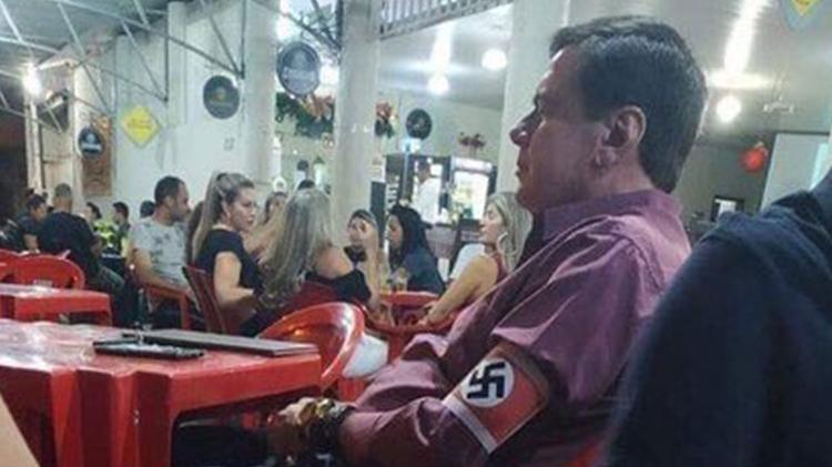 Homem que usou suástica no braço em MG vira réu por apologia ao nazismo