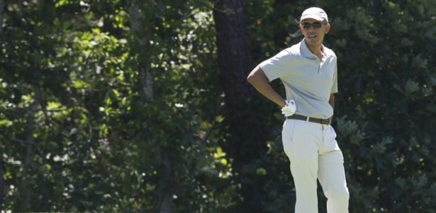 Barack Obama joga golfe durante suas férias do ano passado - Saul Loeb/AFP