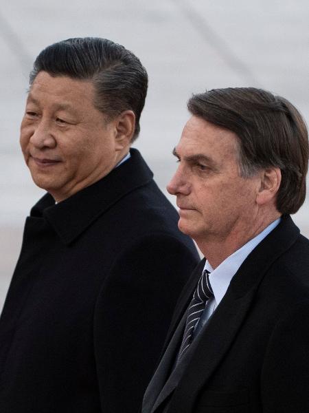 O presidente Jair Bolsonaro e o presidente da China, Xi Jinping - Noel Celis/AFP