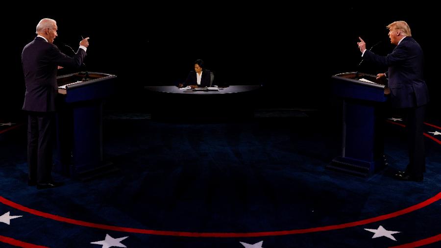 Presidente Donald Trump e o ex-vice-presidente Joe Biden durante o último debate da campanha presidencial dos EUA - Jim Bourg/Pool/Reuters