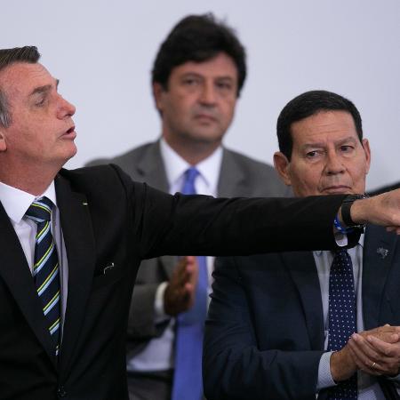O presidente Jair Bolsonaro e o vice durante cerimônia que marca os primeiros 200 dias do governo  - MYKE SENA/ ESTADÃO CONTEÚDO