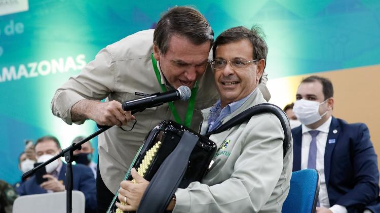 Bolsonaro com o então ministro do Turismo, Gilson Machado, em evento oficial do governo