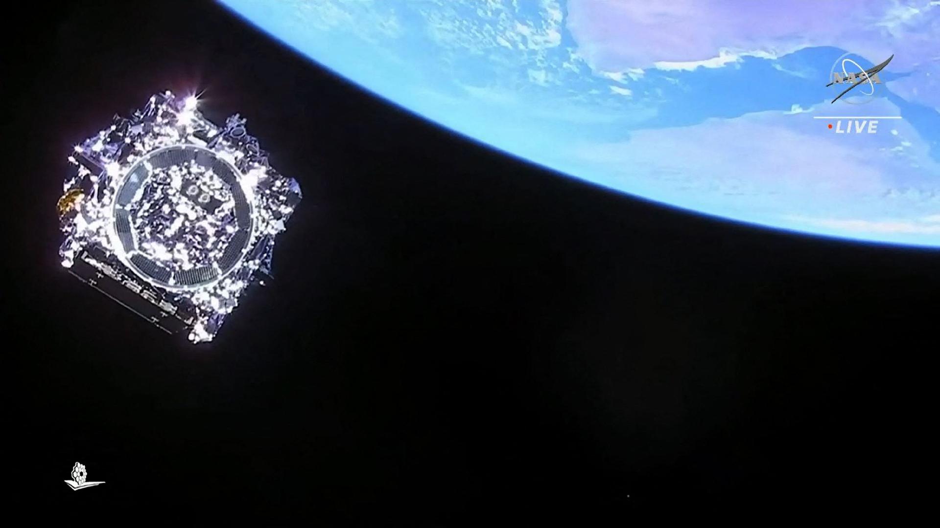 Image captured from NASA's live stream shows the James Webb Space Telescope separating from the Ariane 5 rocket.