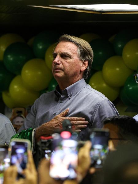 14.out.2022 - Jair Bolsonaro (PL), presidente e candidato à reeleição, participa de encontro com prefeitos de cidades de Minas Gerais ao lado de Braga Netto (PL), seu vice candidato na chapa, e Romeu Zema (Novo), governador de MG - Gilson Junio/Estadão Conteúdo