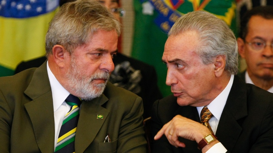 Lula (esquerda) fez menção ao governo de Temer (direita) na defesa contra processo sobre linha de crédito para Angola - Sérgio Lima - 31.mar.2010/Folhapress