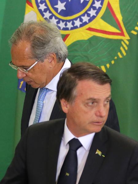 O presidente Jair Bolsonaro e o ministro da Economia, Paulo Guedes - Fátima Meira/Futura Press/Estadão Conteúdo