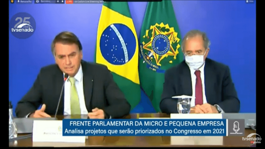 Jair Bolsonaro participa da Frente Parlamentar da Micro e Pequena Empresa ao lado do ministro da Economia, Paulo Guedes - Reprodução/TV Senado