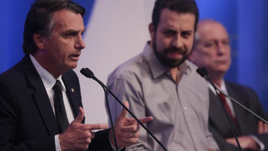 17.ago.2018 - O deputado federal Jair Bolsonaro (PSL) e Guilherme Boulos (PSOL), candidatos á Presidência, durante debate da RedeTV!/IstoÉ 17.ago.2018 - O deputado federal Jair Bolsonaro (PSL) e Guilherme Boulos (PSOL), candidatos á Presidência, durante debate da RedeTV!/IstoÉ