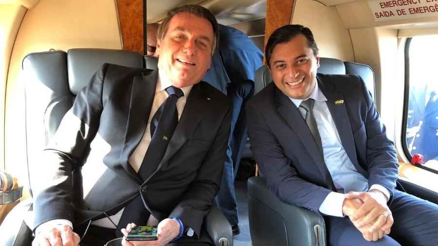 25.jul.2019 - Então presidente, Bolsonaro sobrevoa o Distrito Federal com o governador do Amazonas, Wilson Lima