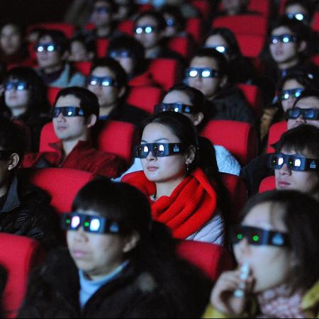 Espectadores assistem a uma versão em 3D do filme "Avatar"  - AFP/Getty Images/NYT