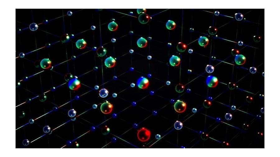 Ilustração conceitual das complexas correlações magnéticas observadas por cientistas no experimento inovador. As diferentes cores representam os seis possíveis estados internos dos átomos de itérbio - Ella Maru Studio/Cortesia E.Ibarra/Rice Univ.
