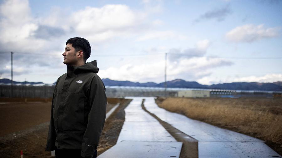 7.fev.2021 - Yuto Naguma, sobrevivente do tsunami de 2011 que devastou o Japão - Behrouz Mehri/AFP