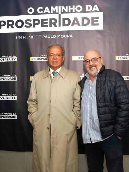 Ex-ministro Paulo Guedes (e) e Paulo Moura, diretor do documentário "O Caminho da Prosperidade", na estreia do filme em Nova York
