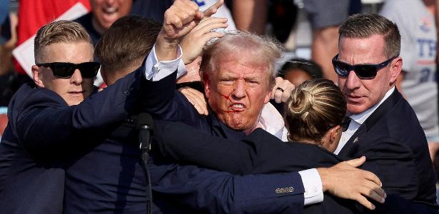 Donald Trump é retirado de comício por seguranças após ter sido ferido na orelha