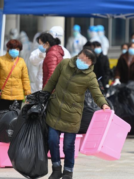 Pacientes deixam hospitais temporários em Wuhan, da China - Xinhua/Chen Yehua