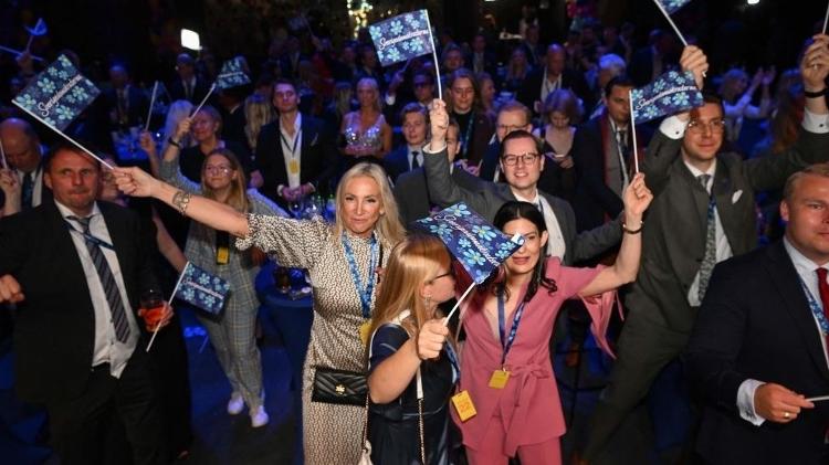 SD supporters celebrate the results of an exit poll after Sunday's vote - Getty Images - Getty Images