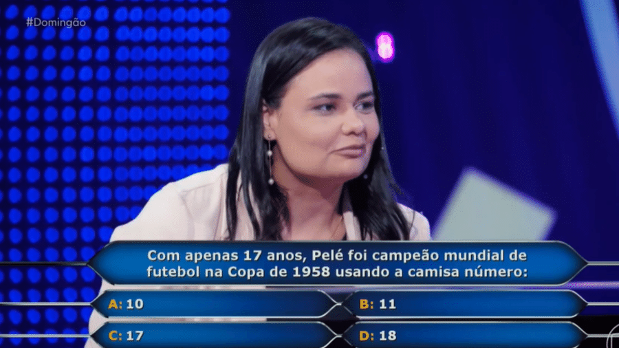 Jullie Dutra, 38, foi a primeira vencedora do "Quem quer ser um milionário" com pergunta sobre Pelé  - Reprodução/Globoplay
