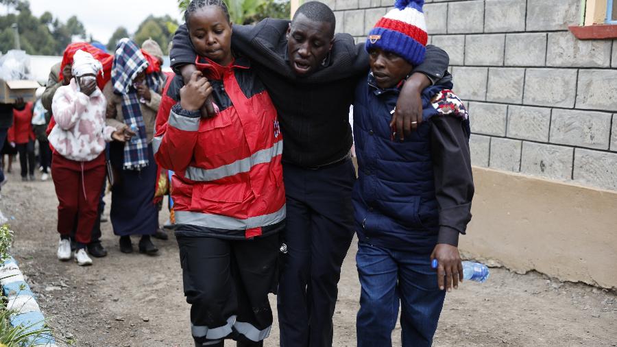 Pelo menos 17 crianças morreram depois que um incêndio atingiu o dormitório de uma escola primária no centro do Quênia - SIMON MAINA/AFP