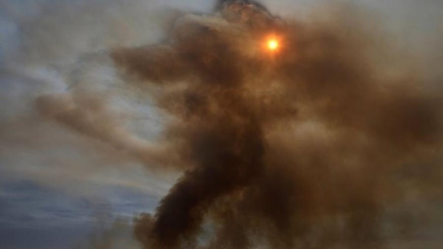 Fumaça em Brasília, em meio à baixa umidade, em foto de junho; eventos extremos aumentam com as mudanças climáticas - Reuters