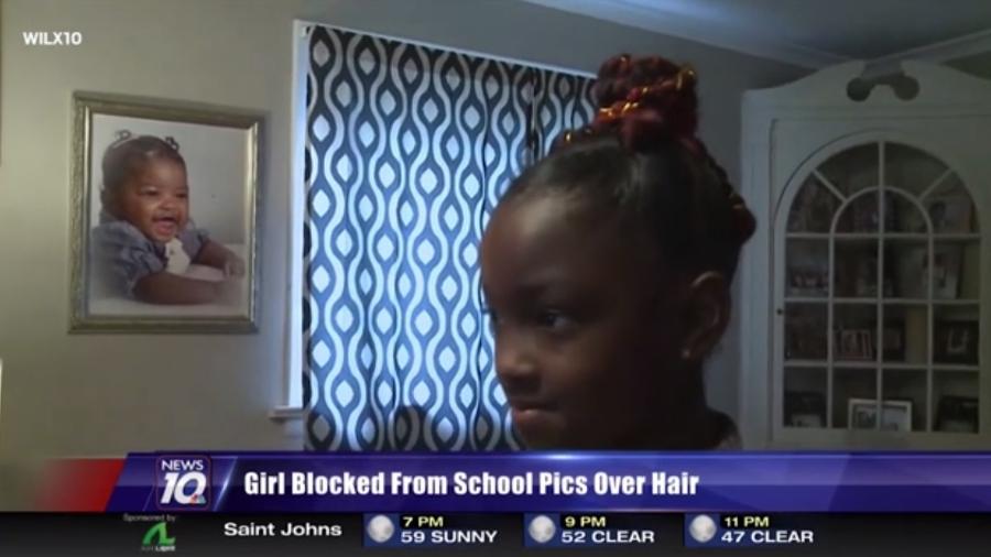 Marian Scott, de 8 anos, é proibida de tirar foto em escola por causa de seus cabelos - Reprodução/WILX