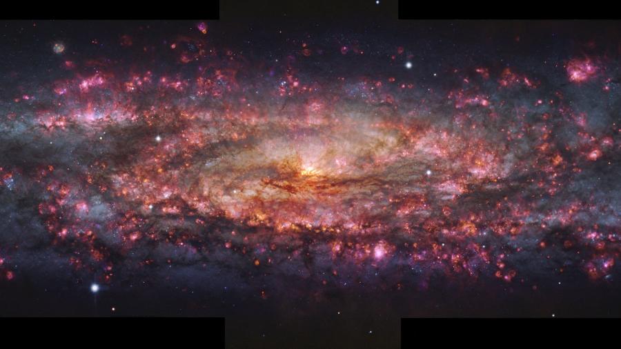 Imagem divulgada pelo Observatório Europeu do Sul em 17 de junho de 2025, mostra uma imagem detalhada, em mil cores, da Galáxia do Escultor, capturada com o instrumento MUSE no Very Large Telescope (VLT) do ESO Imagem divulgada pelo Observatório Europeu do Sul em 17 de junho de 2025, mostra uma imagem detalhada, em mil cores, da Galáxia do Escultor, capturada com o instrumento MUSE no Very Large Telescope (VLT) do ESO