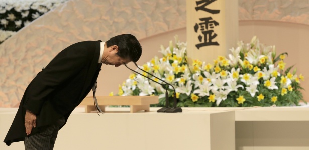 O primeiro-ministro do Japão, Shinzo Abe, durante cerimônia neste domingo  - Xinhua