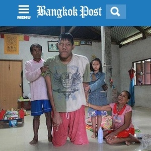 Tailandês de 2,69 m tinha dificuldades para ficar em pé - Reprodução/Bangkok Post