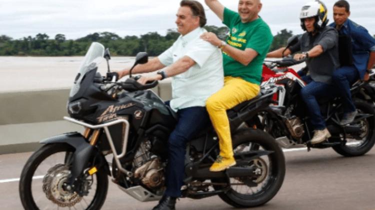 Bolsonaro e Luciano Hang andam de moto sem capacete Bolsonaro e Luciano Hang andam de moto sem capacete