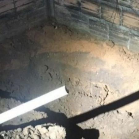Polícia encontrou cova que estava sendo aberta no quintal da casa da família - Reprodução/ TV Centro América