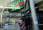 Bolsas globais sobem com petróleo em queda e alívio com ações de tecnologia