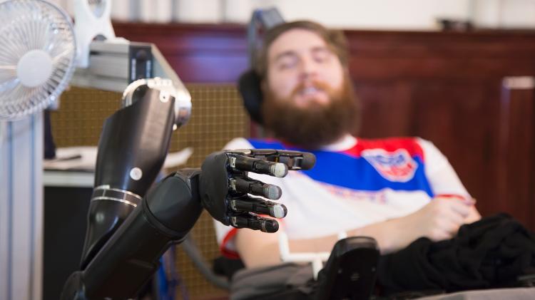 Quadriplegic Nathan Copeland stretches out his robotic hand with the power of thought - UPMC/Pitt Health Sciences - UPMC/Pitt Health Sciences