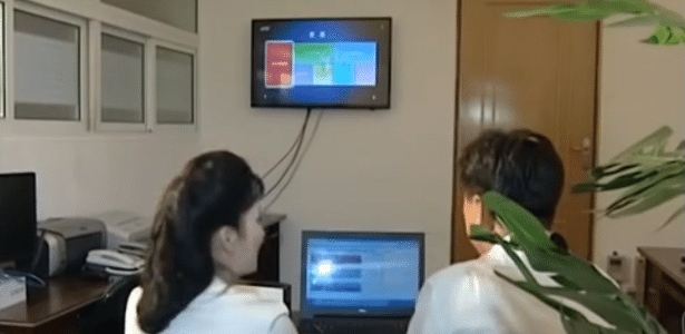Publicidade da televisão norte-coreana mostra usuário do serviço Manbang - Reprodução