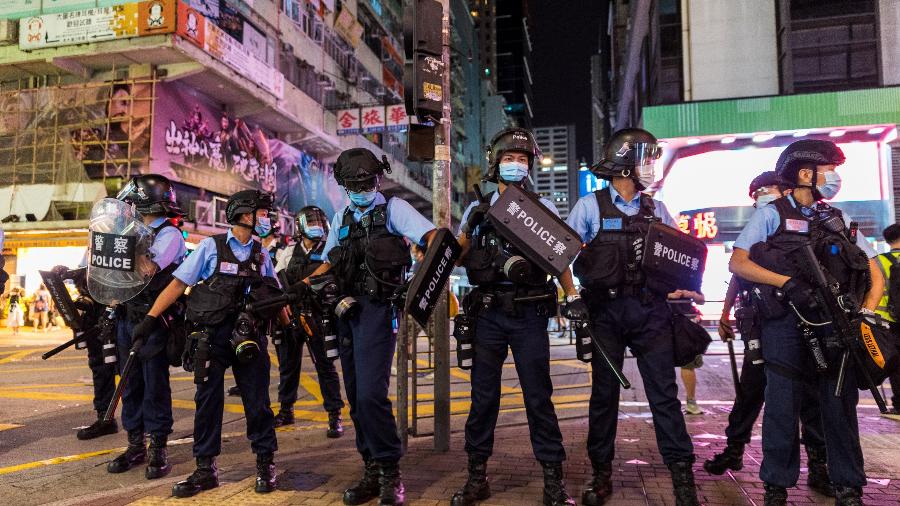 O protesto pacífico foi imediatamente considerado ilegal e a tropa de choque usou cassetetes e spray de pimenta para dispersar a multidão - Getty Images