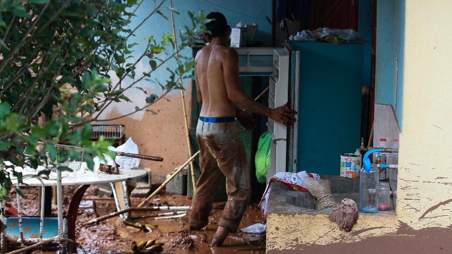25.jan.2019 - Morador de Brumadinho tenta recuperar bens em sua casa após rompimento de barragem de rejeitos da Vale - Xinhua/Ernesto Rodrigues/AGENCIA ESTADO