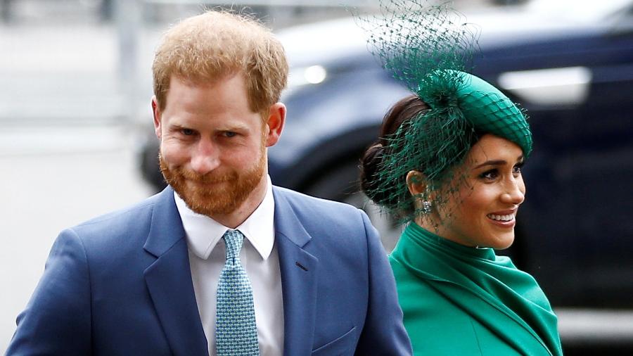 Príncipe Harry ao lado da esposa, Meghan Markle, em Londres (Reino Unido) - 