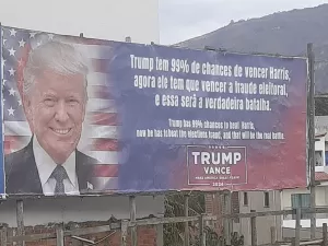 Cidade mineira tem disputa de outdoors pró-Trump e pró-Kamala