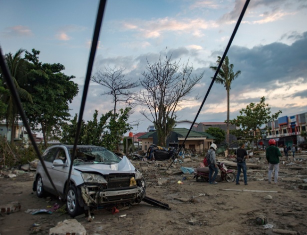 "Quando chegamos a Petobo, encontramos um lugar que foi apagado do mapa pelo poder do tsunami", disse um representante do Movimento Internacional da Cruz Vermelha - Bay Ismoyo/AFP