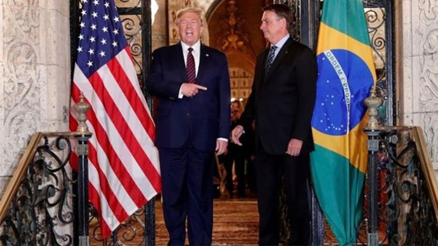 Bolsonaro e Trump jantaram no sábado (7/3): presidente americano disse que o país sempre "ajudaria o Brasil" - TOM BRENNER/REUTERS via BBC