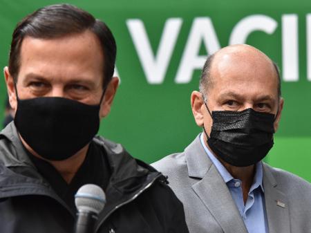 O governador João Doria (PSDB) ao lado de Dimas Covas - Roberto Casimiro/Estadão Conteúdo